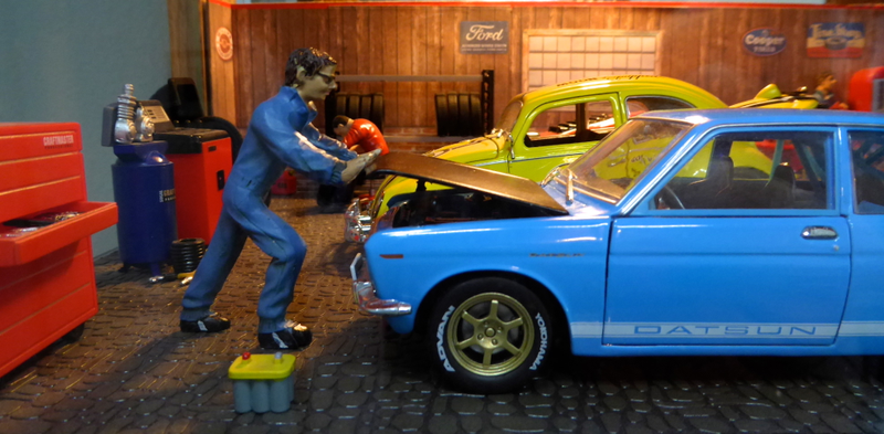 Ken, an employee is about to check on a classic Datsun 510